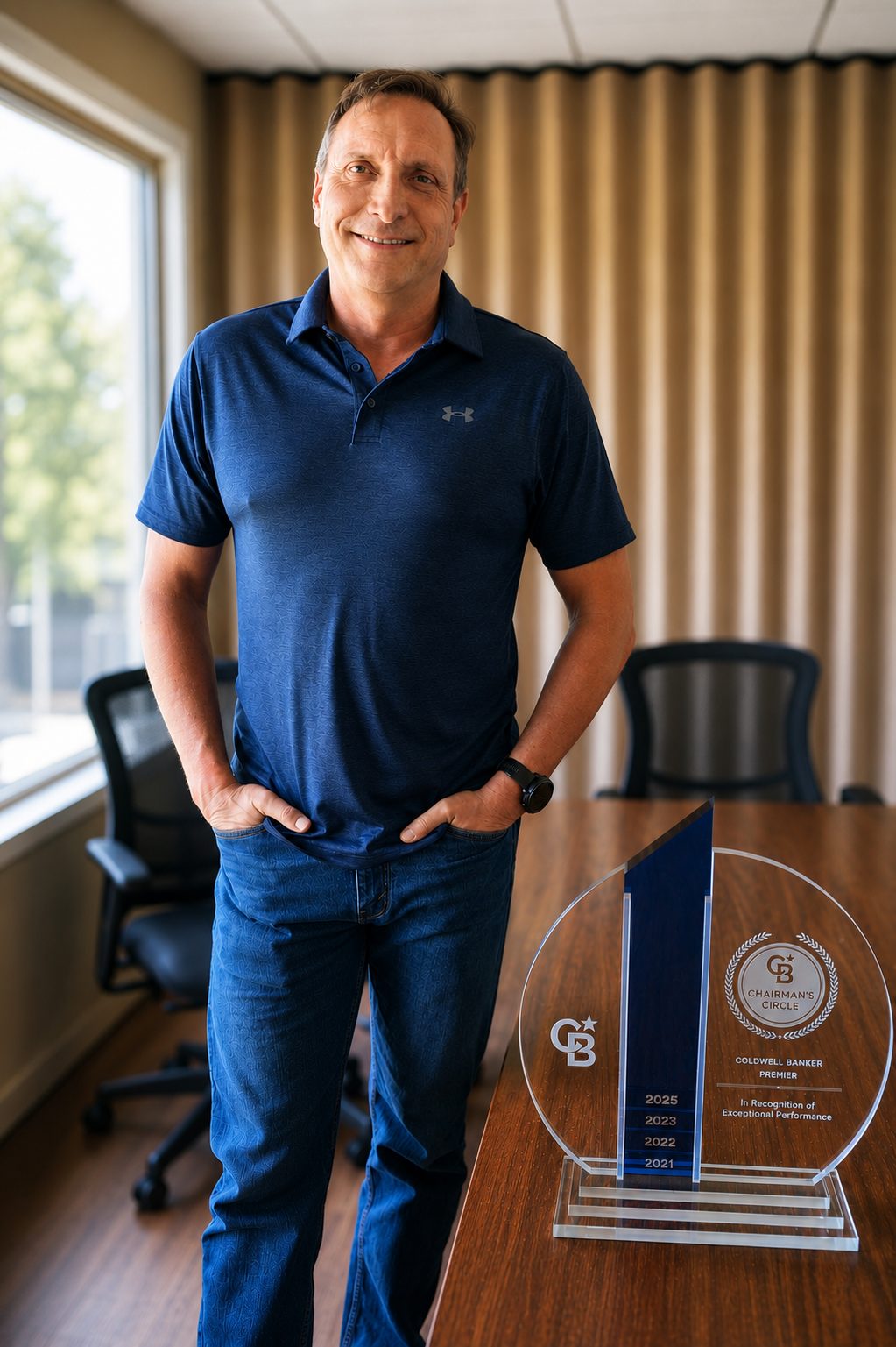 Steve DuBrueler, Founder and CEO of Coldwell Banker Premier, with the Chairman's Circle Award